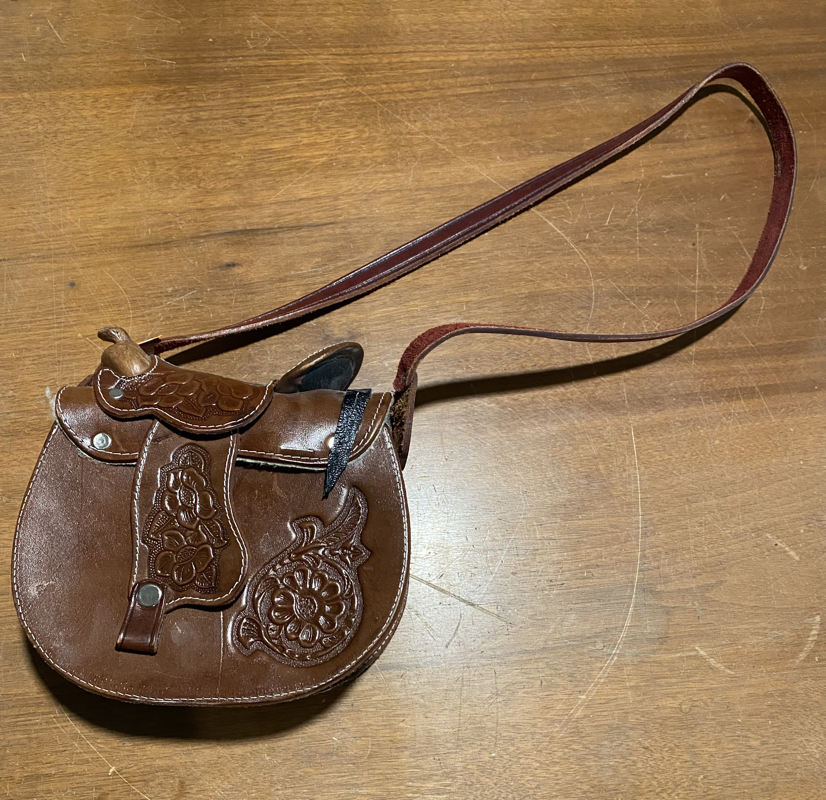 🐴SOLD🐴 New in the shop. Tooled leather saddle purse. Unlined except on  the inside flap (faux shearling). Beautiful design, some pat... | Instagram